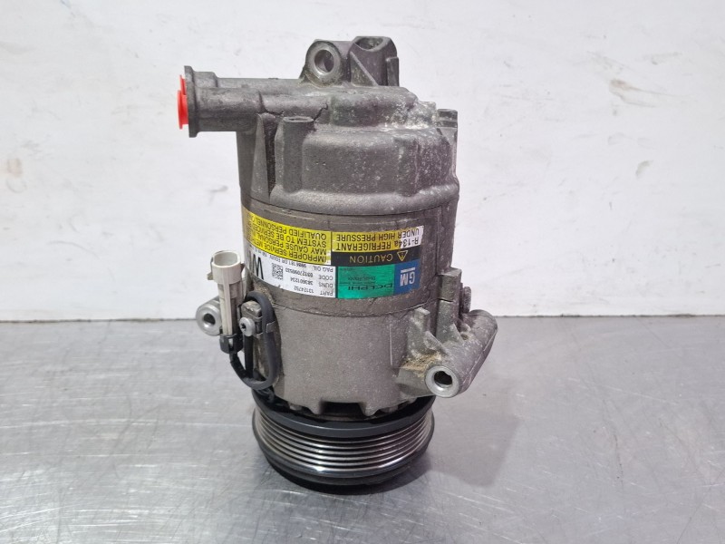 Recambio de compresor aire acondicionado para opel astra referencia OEM IAM 13124752  