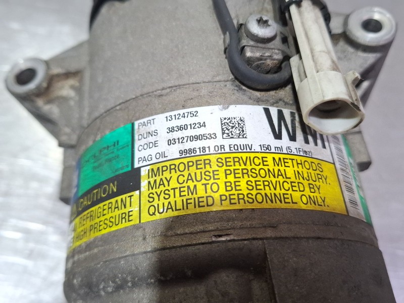 Recambio de compresor aire acondicionado para opel astra referencia OEM IAM 13124752  